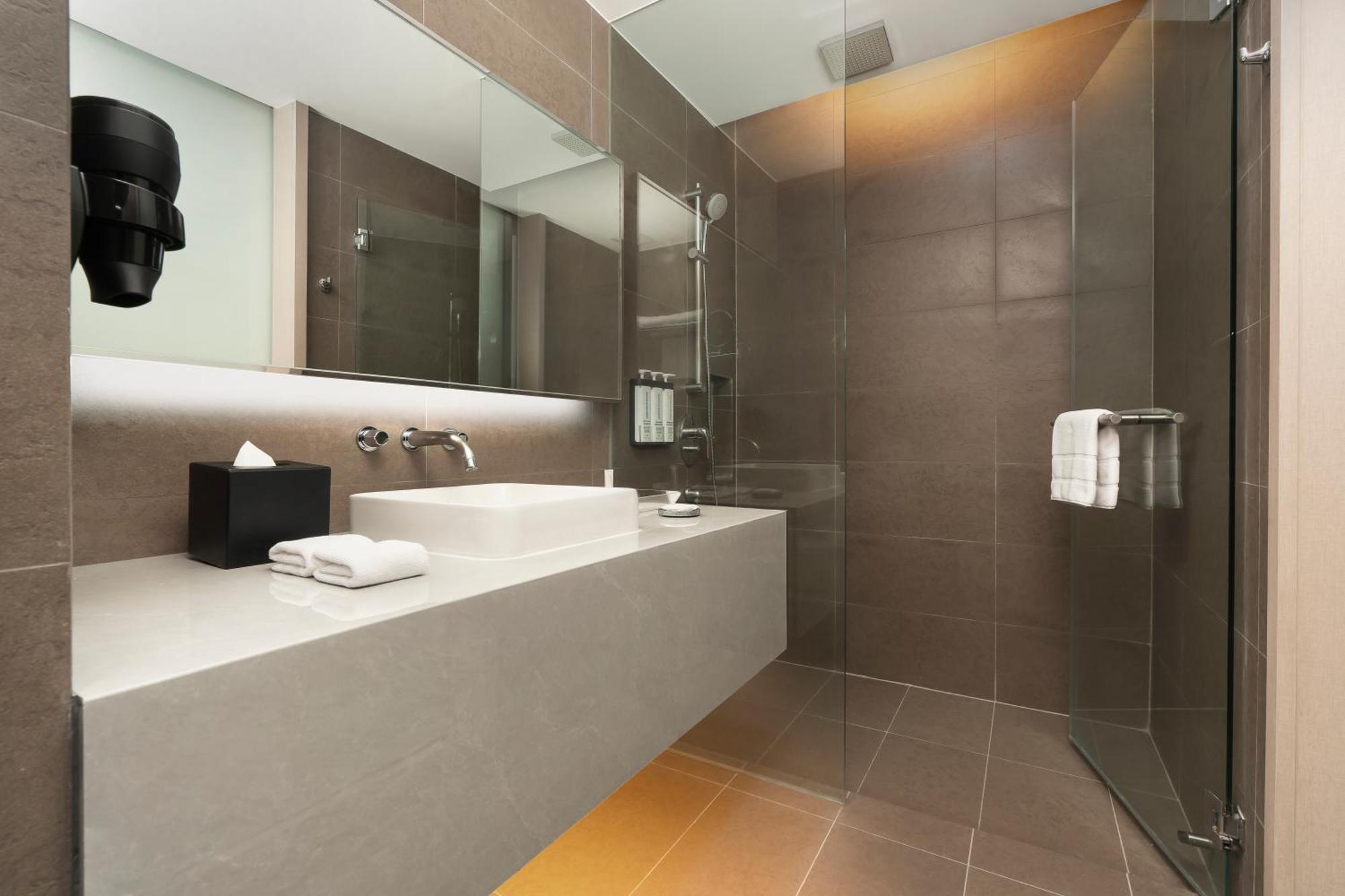 Deluxe Double Room with Two Single Beds and Sofa Bed